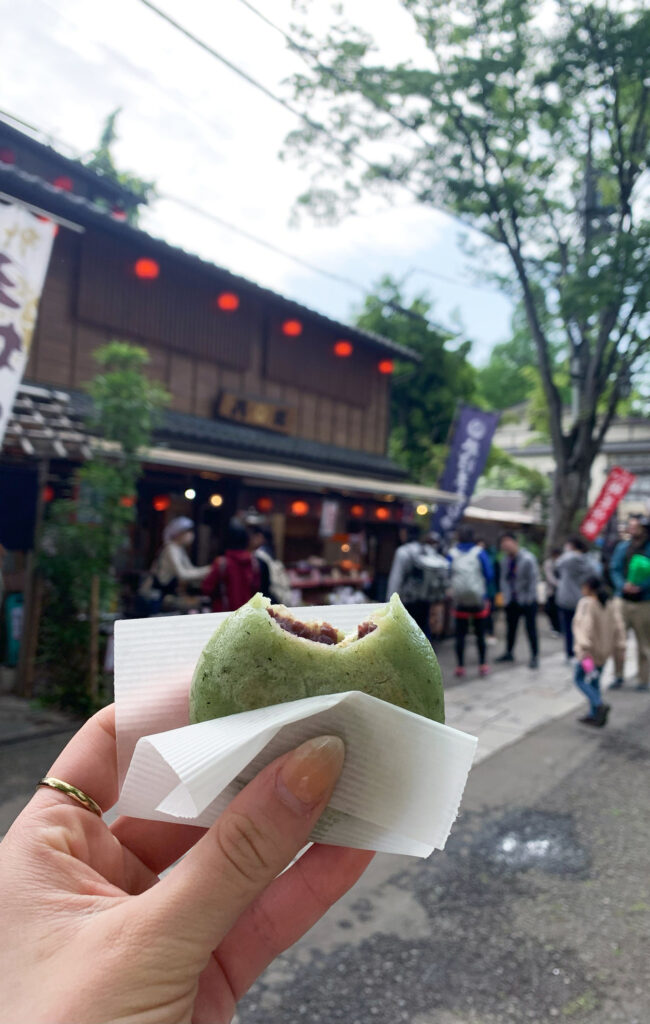 The red bean manju I had, with the shopping street as the backdrop!