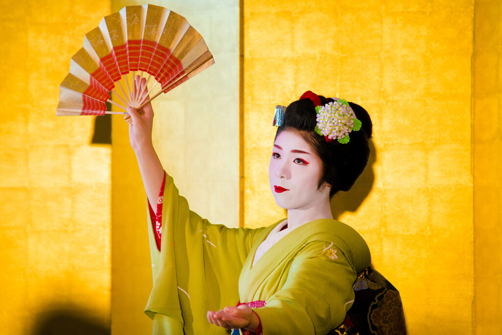 Geisha shows her performance in Japan.