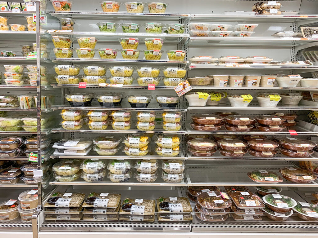 Hiroshima,Japan-July 2019: Japanese style bento displayed at a rack in the convenience store.